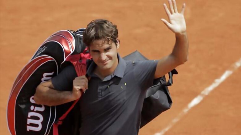 Federer earns hard-fought win against Mahut