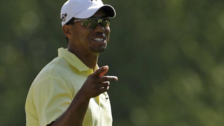 Woods grouped with Choi, Kuchar in comeback bid