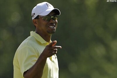 Woods grouped with Choi, Kuchar in comeback bid