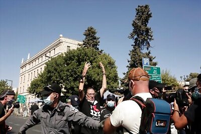 Israel clears protest camp ahead of pro-Netanyahu rally