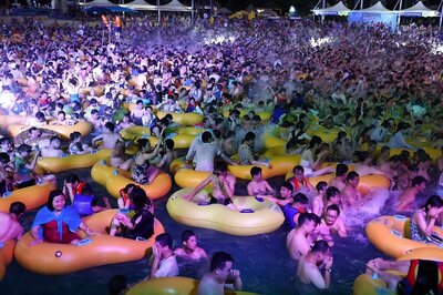 China's State Newspapers Defend Wuhan Amusement Park After Densely Packed Pool Party Sparks Outrage