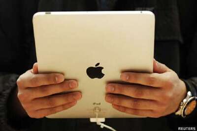 Apple partners Cisco to boost iPad, iPhone use at businesses