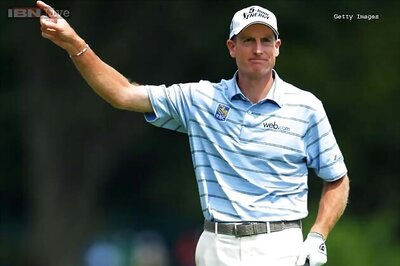 Furyk seizes PGA lead with 65, Woods at 71