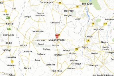 Two killed as car collides with truck