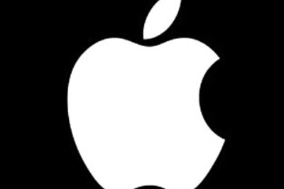 Apple smashes Street forecasts, stock hits record