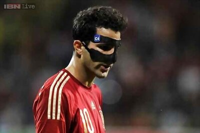 Cesc Fabregas scores in Spain's 2-1 win over Costa Rica