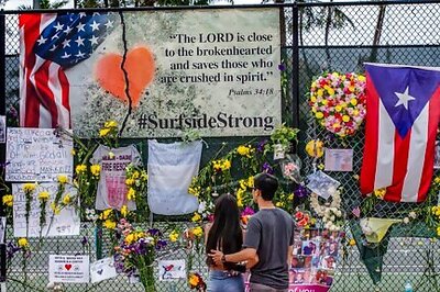 Families, Rescuers Hold Vigil Near Collapsed Building