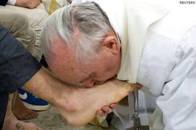 Pope washes women's feet in break with church law