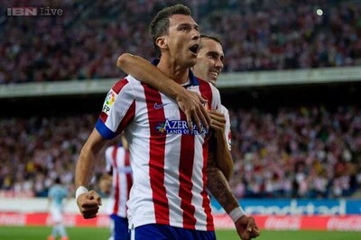 Atletico Madrid hang on to beat promoted Eibar 2-1 in La Liga