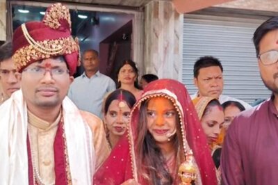 Bride in Wedding Attire Reaches Booth, Casts Vote
