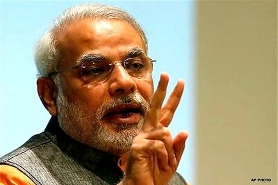Modi takes on Congress over Aakash tablets' delay
