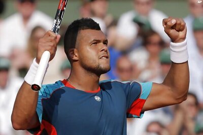 Tsonga, Mahut win to make French crowd happy