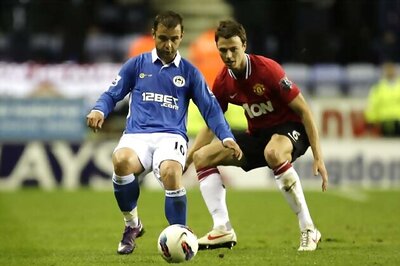 Leaders Man Utd without Evans for Spurs trip