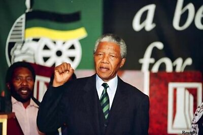 South Africa: Mandela 'improving' as Obama flies in