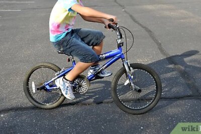 How to Ride a Bike With One Hand