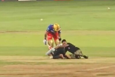 WATCH: Virat Kohli Embraces RCB Fan Who Breaches His Way Onto the Crease to Fall at His Feet