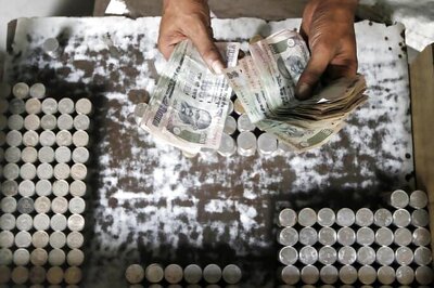 Rupee gains, opens at 65.17 per dollar on Thursday
