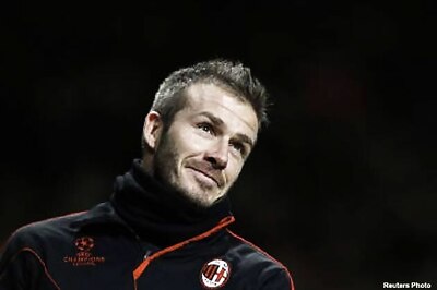 Coach asks injured Beckham to join England