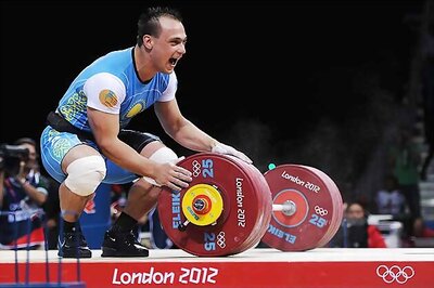 Olympics: Ilyin wins gold in 94kg weightlifting