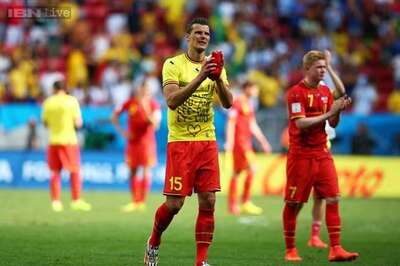 Belgium defender Van Buyten announces retirement