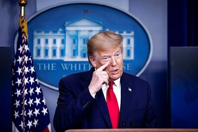 Trump Waves a Swab in Front of Reporters, Tells Them He'll Increase its Production for Covid-19 Testing