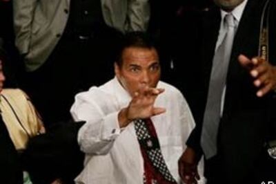 Ali cheers as Laila defends her title