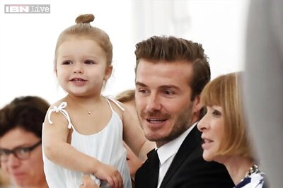 Harper steps out with dad David Beckham for New York fashion week