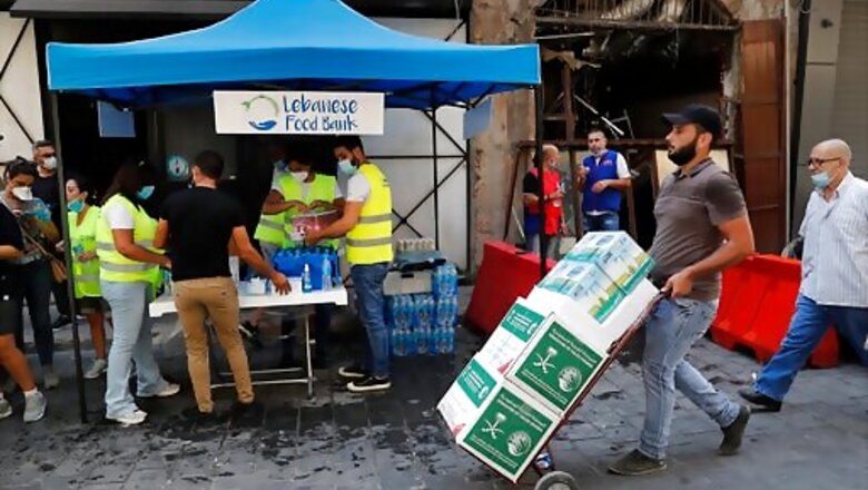 Abandoned by state after explosion, Lebanese help each other