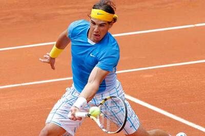 Nadal, Federer reach Madrid semis