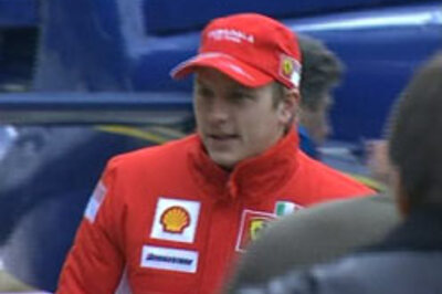 Raikkonen blazes in Barcelona rain