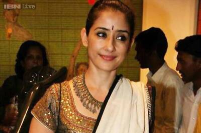 For which Southern film has Manisha Koirala postponed Rajkumar Santoshi's project?