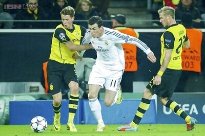 Real Madrid survive Borussia Dortmund scare to reach Champions League semi-finals