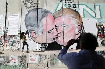 Donald Trump and Benjamin Netanyahu Share a Kiss on Mural on West Bank Wall in Israel