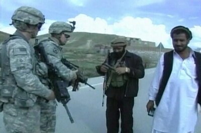 Afghans guarding US bases linked to Taliban